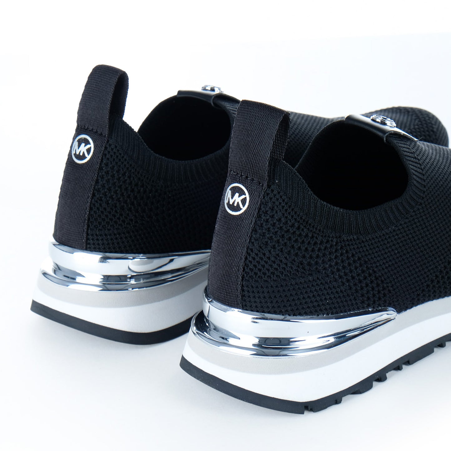 Ténis Mulher Michael Kors Pretos Slip-On em Malha com Detalhes Prateados