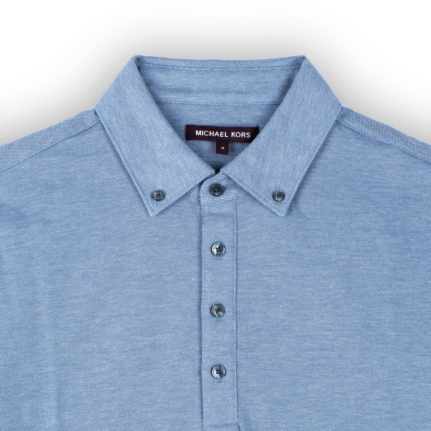 Homem Polo Michael Kors Azul Claro com Detalhe Moderno